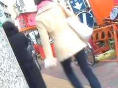 Asian girl got skirt sharked on her bicycle with people near
