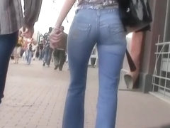 Tight jeans perfectly fit her beautiful ass and legs