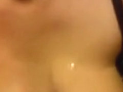 Breasty wife gives titjob and receives jizzed