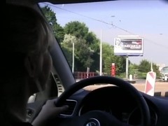 Lesbians playing in the car while driving girlfriend licking
