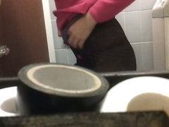 The ass of amateur spied while her pissing on toilet