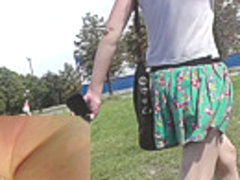 Pretty chick followed by a guy with upskirt camera