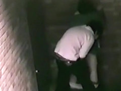 Voyeur captures an asian student getting doggystyle fucked in an alley