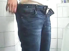 Hidden camera films unaware woman while pissing