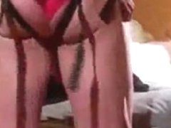 Cross-dresser gets fucked with a strap on dildo