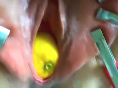 Torturing her pink slippery vagina