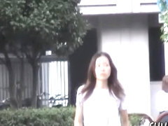Curious long-haired Asian babe getting tricked during quick sharking action