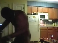 Ponytailed brunette milf fucks a black guy in various positions on the sofa, while her cuckold hus.