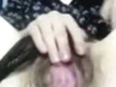 Big bushy cum-aperture of Asian slut receives pushed with a plastic dildo