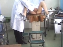 Japanese hottie exposed in a medical exam voyeur video