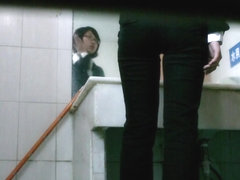 Redhead Japanese girl makes a quick piss on hidden cam