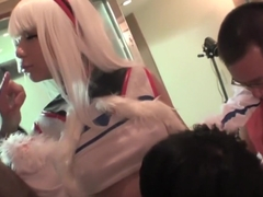 Asian in cosplay jacks one cock while riding another