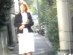Skirt sharking of an attractive red haired Asian chick