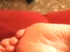 This nasty amateur cumshot video shows me jerking my wang over my hon's feet and cumming all over .