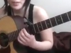 I am playing guitar in my amateur webcam clip