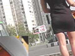 Sexy girl caught on upskirt cam on the way to her boy