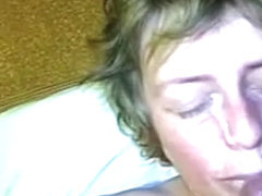 Nasty wife getting her face covered in warm spunk