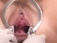 A doll and a monster speculum both in her pussy-wow!