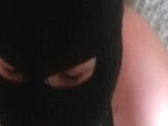 Masked girl gives kinky blowjob