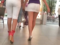 Two amazing brunette fine ass sluts in a shopping mall voyeur upskirt