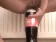 Small legal age teenager tries to ride a coke glass