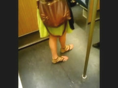 Feet in a metro train III