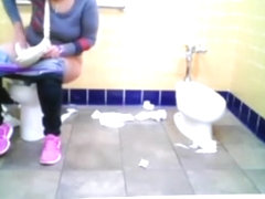 Chubby woman spied in public toilet peeing