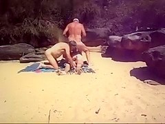 4 guys suck cock at the beach