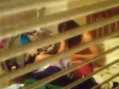 Voyeur tapes 2 neighbor girls naked through their bedroom window